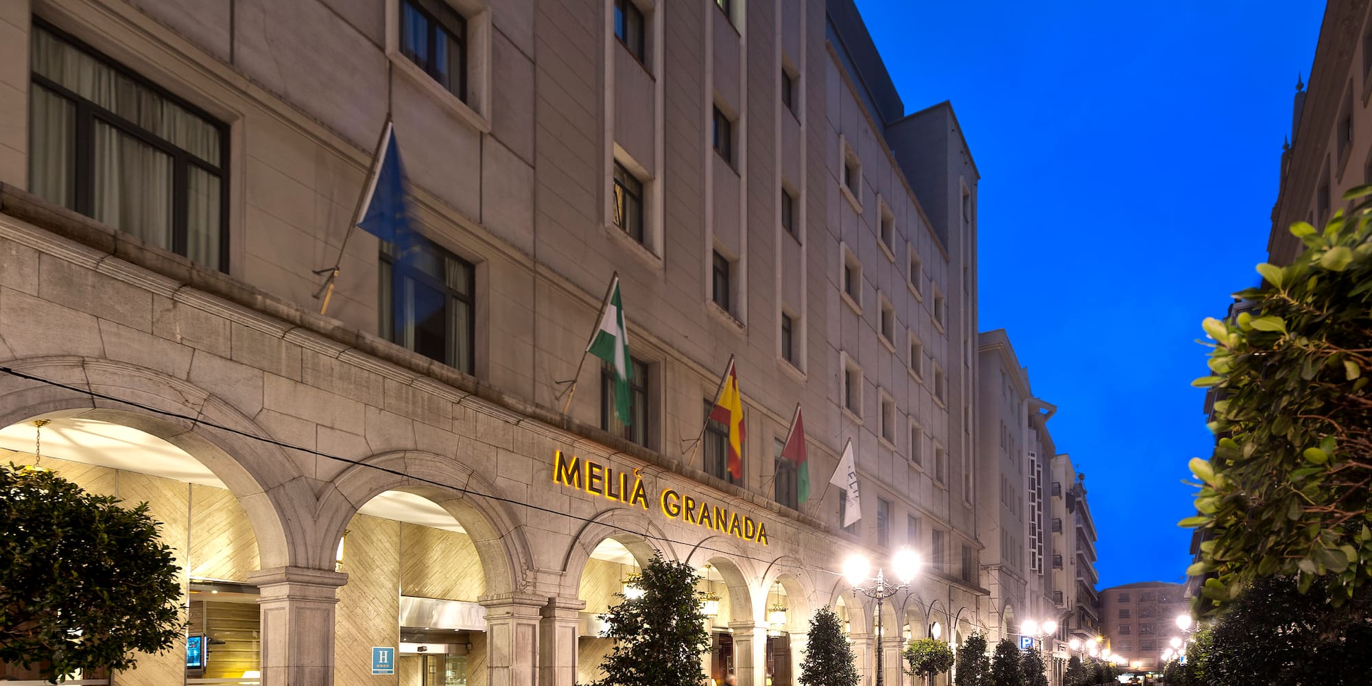 a building with flags on the front