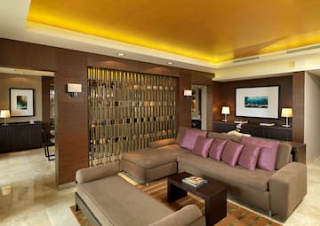 a living room with a couch and a tv