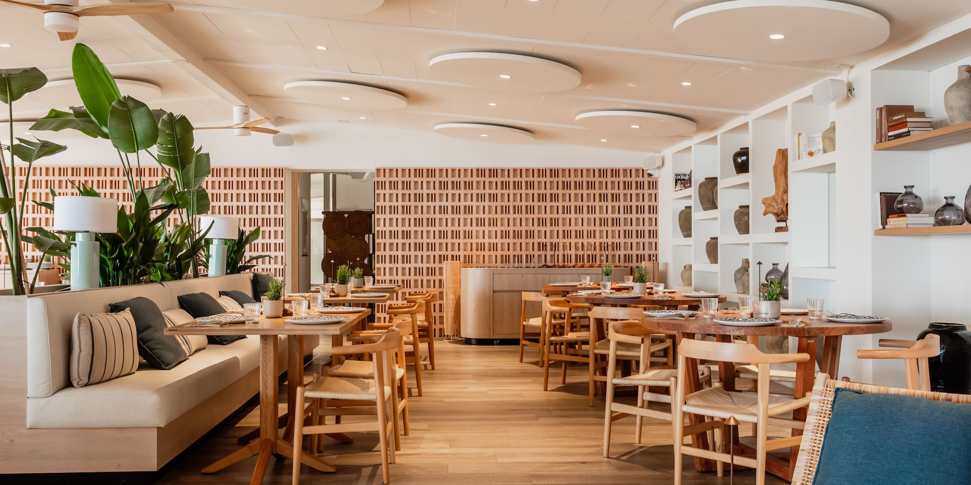 a room with tables and chairs