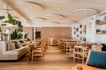 a room with tables and chairs