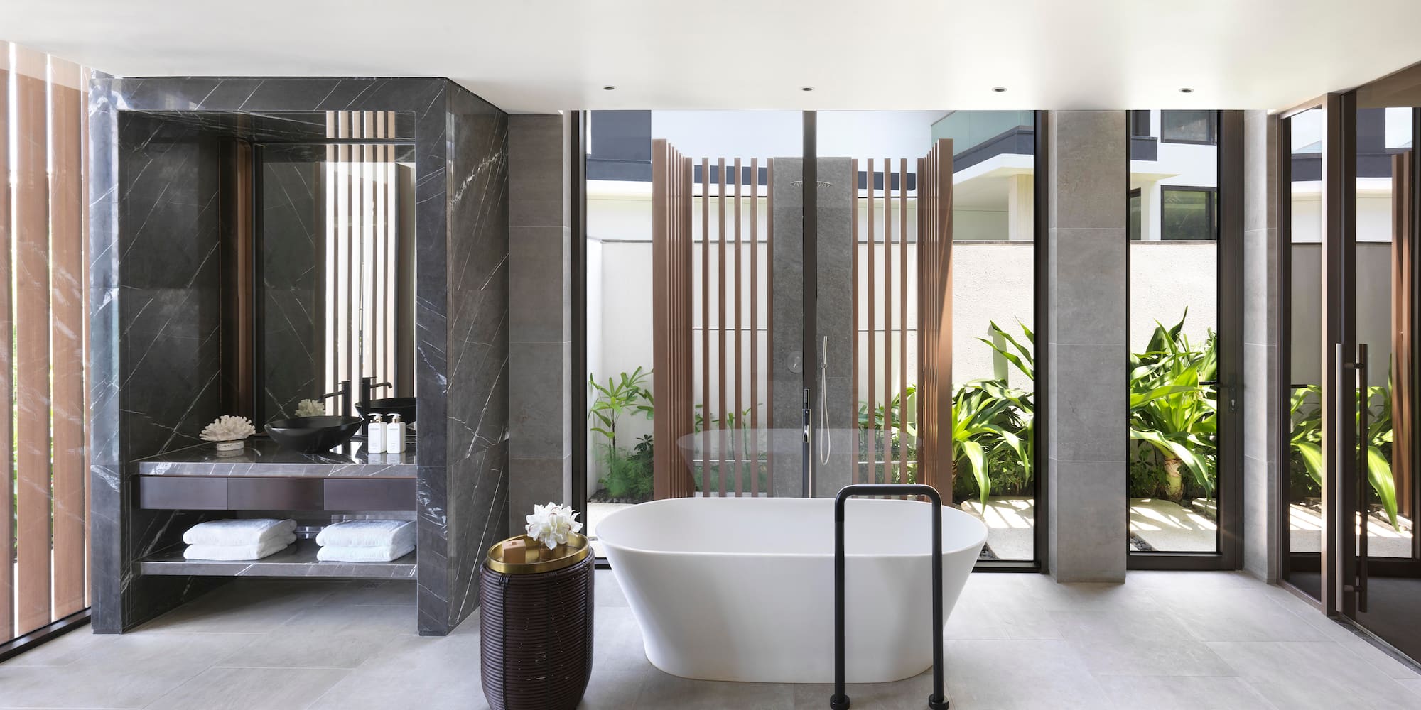 a bathroom with a tub and a tub in it