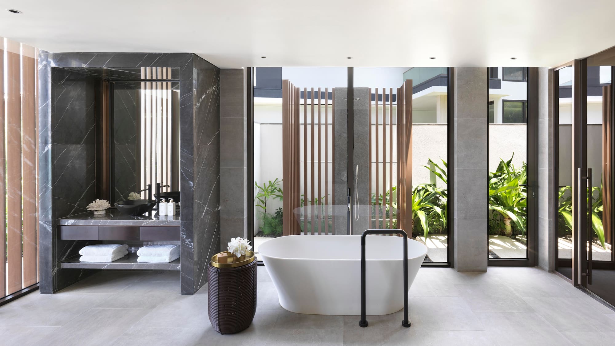 a bathroom with a tub and a tub in it