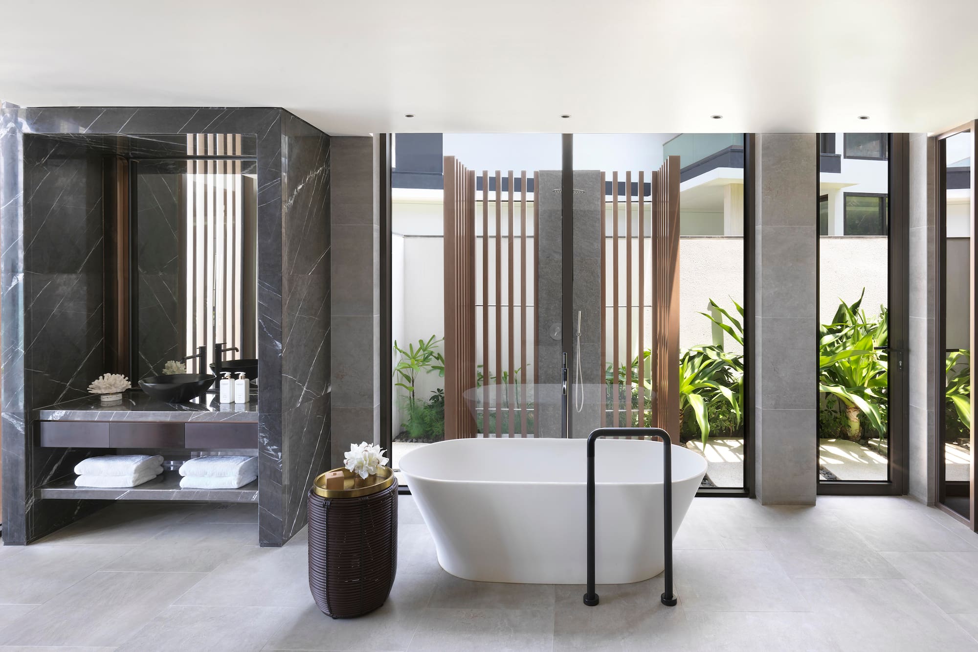 a bathroom with a tub and a tub in it