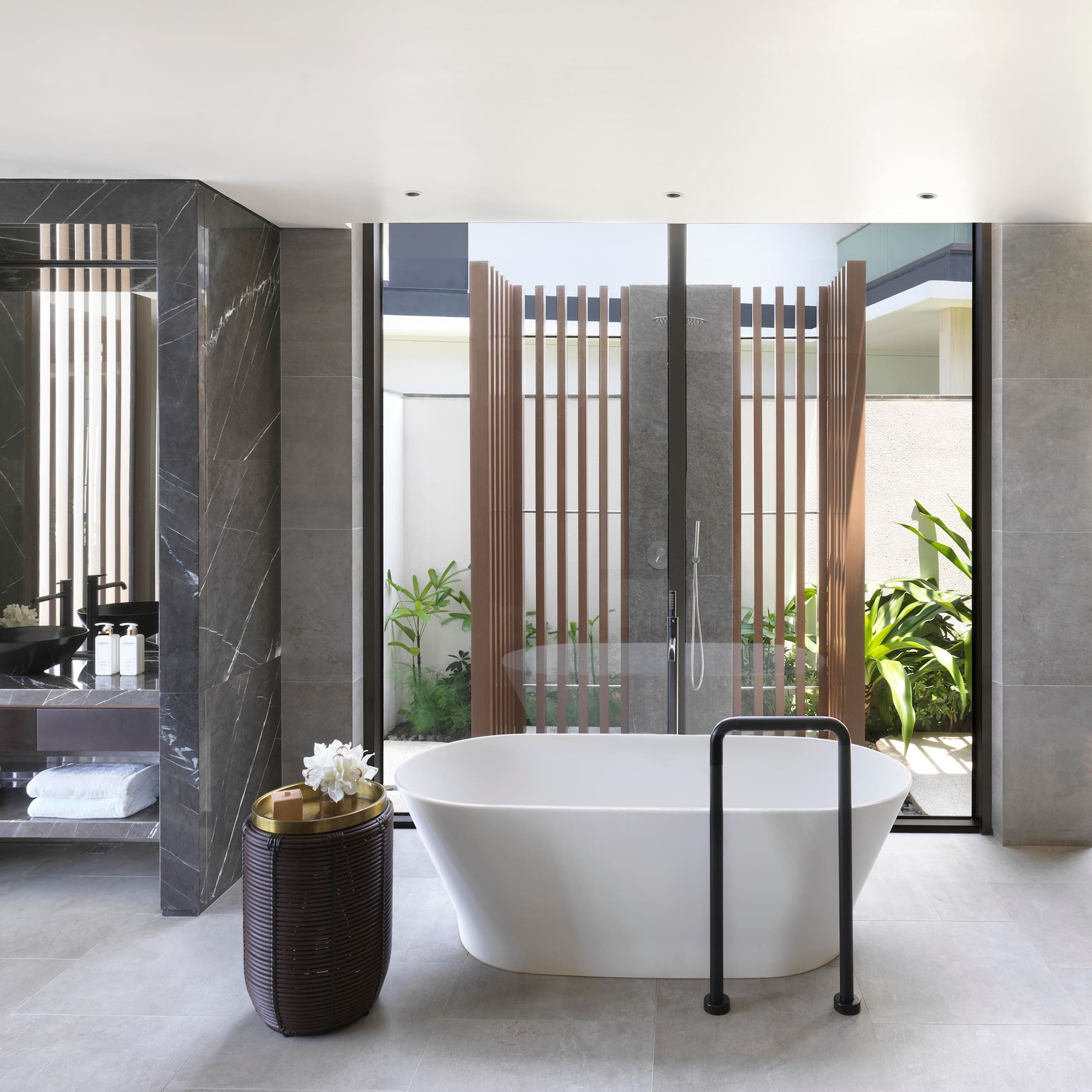 a bathroom with a tub and a tub in it