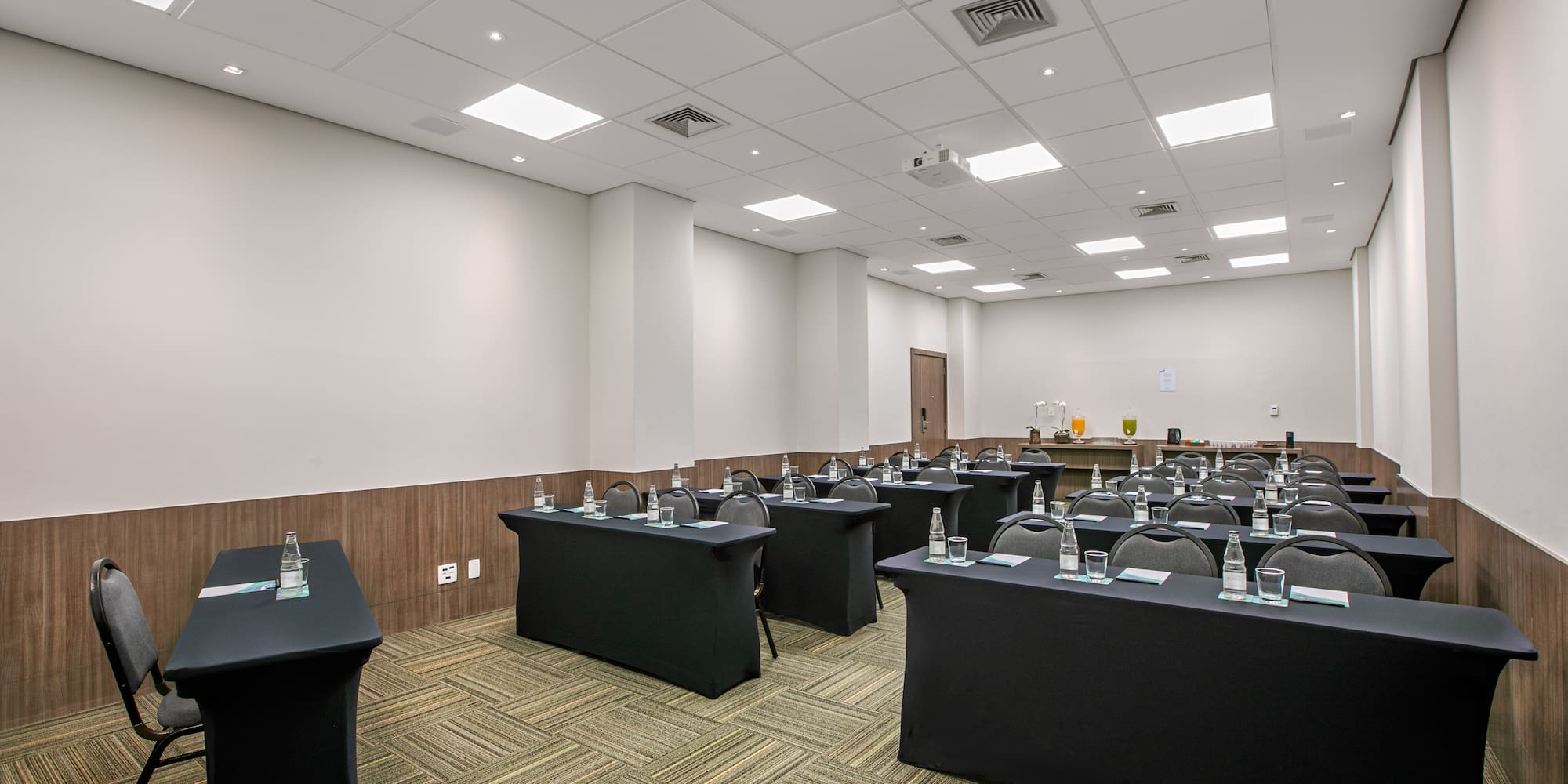 a room with tables and chairs