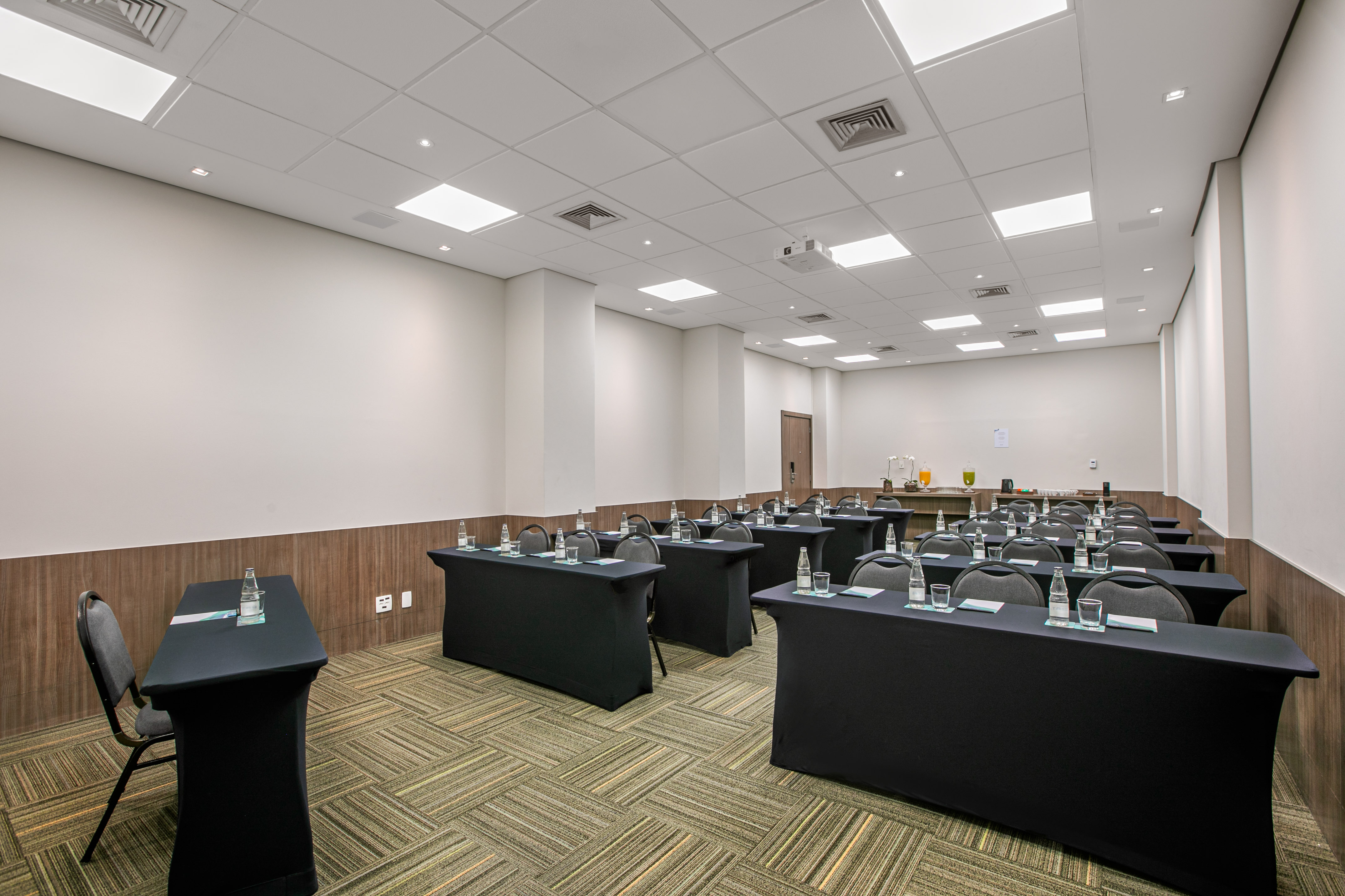 a room with tables and chairs