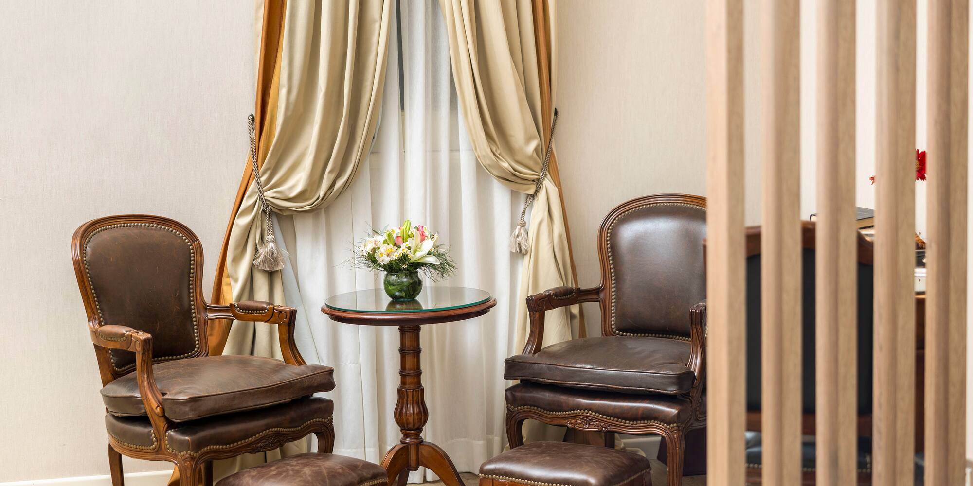 a room with chairs and a table