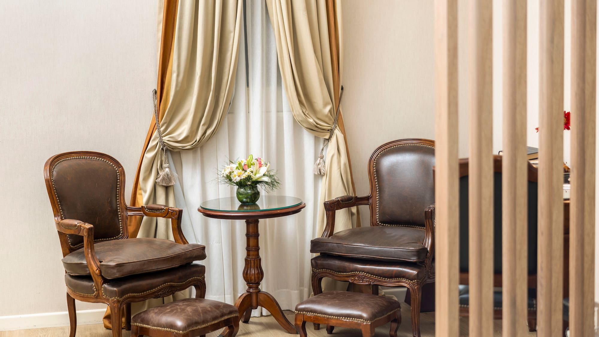 a room with chairs and a table