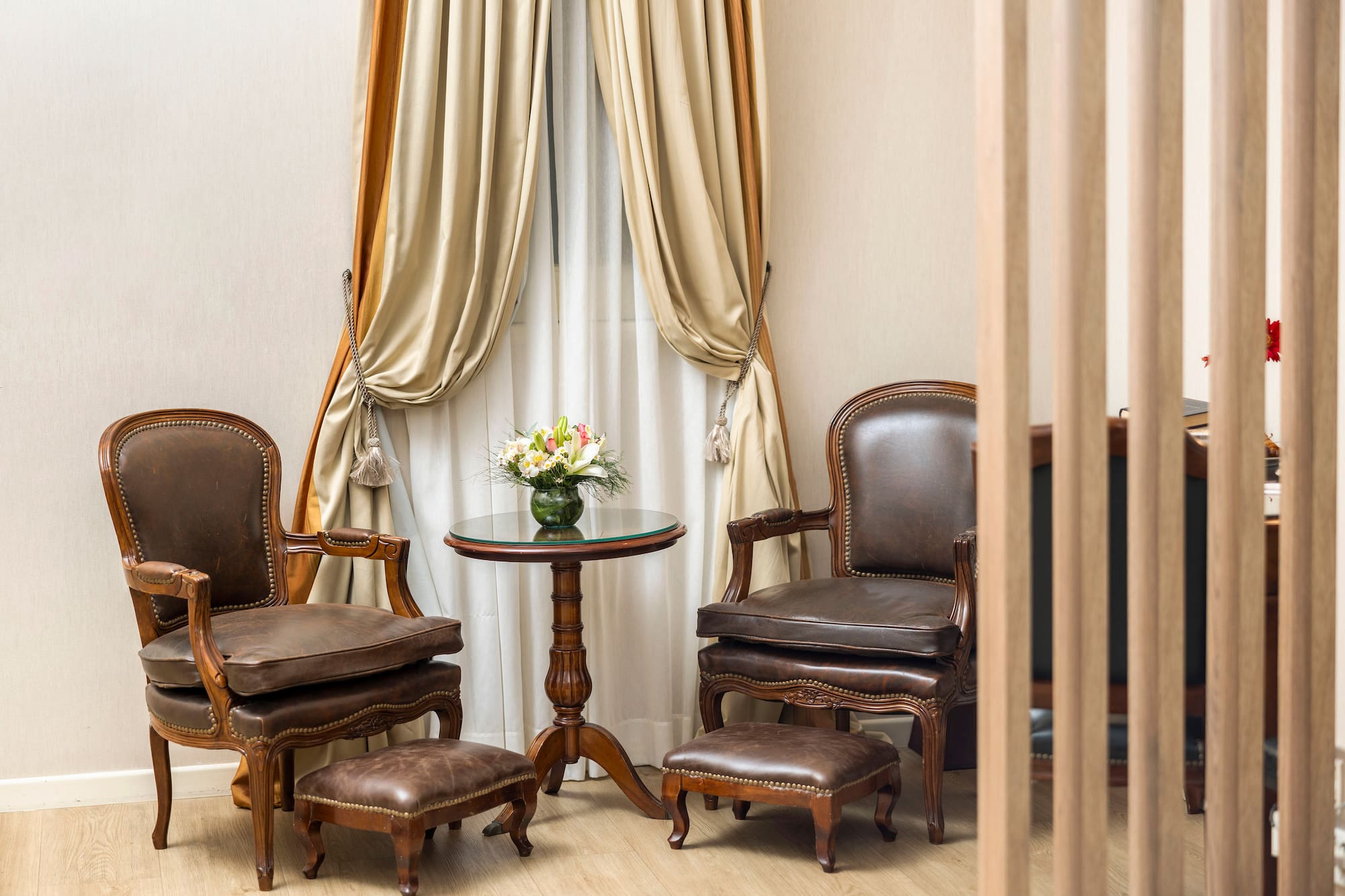 a room with chairs and a table