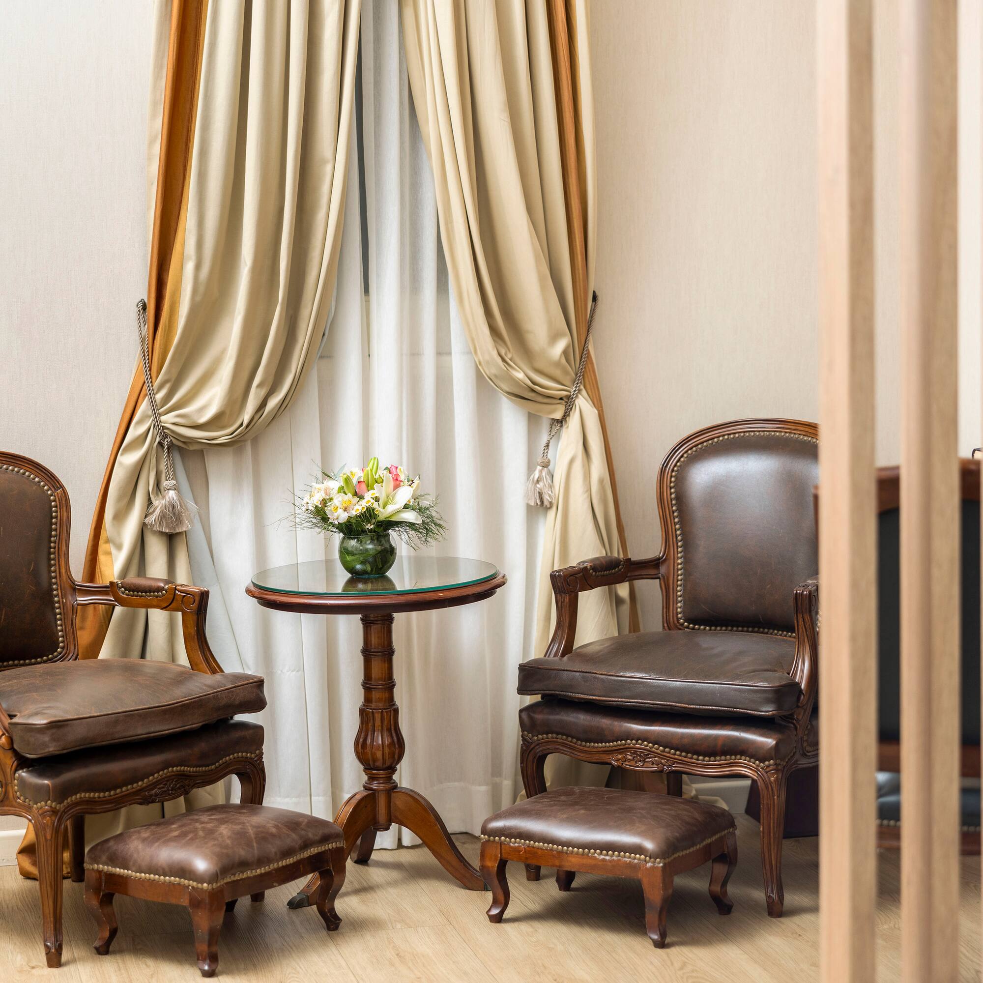 a room with chairs and a table