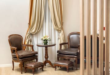 a room with chairs and a table