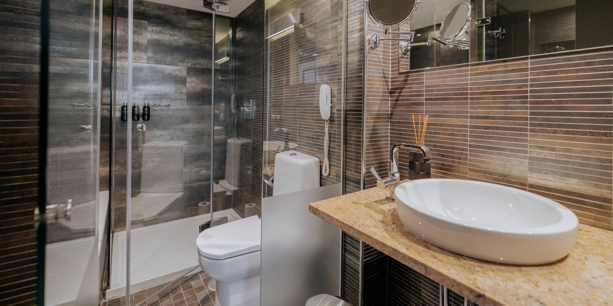 a bathroom with a sink and shower