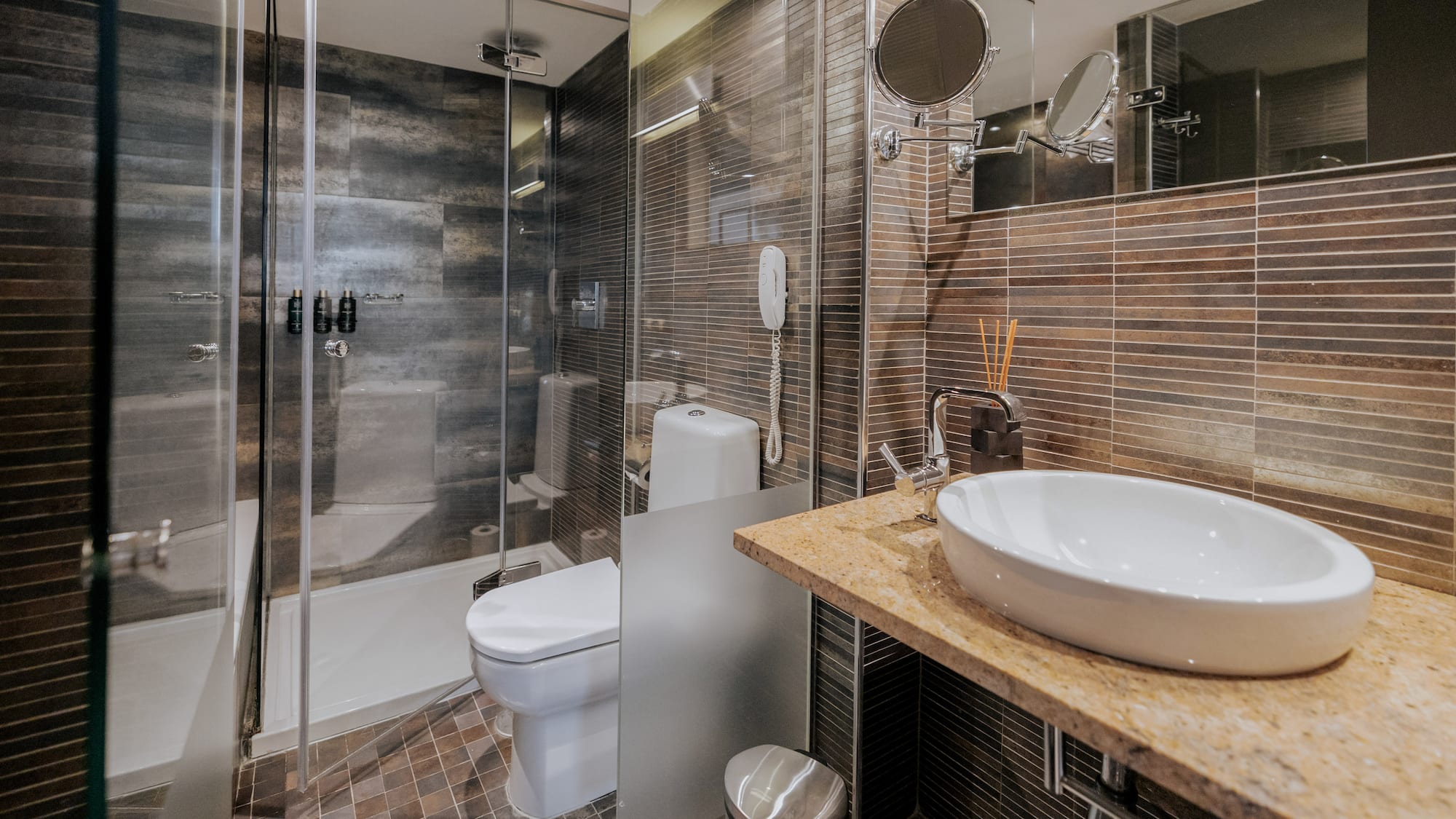 a bathroom with a sink and shower