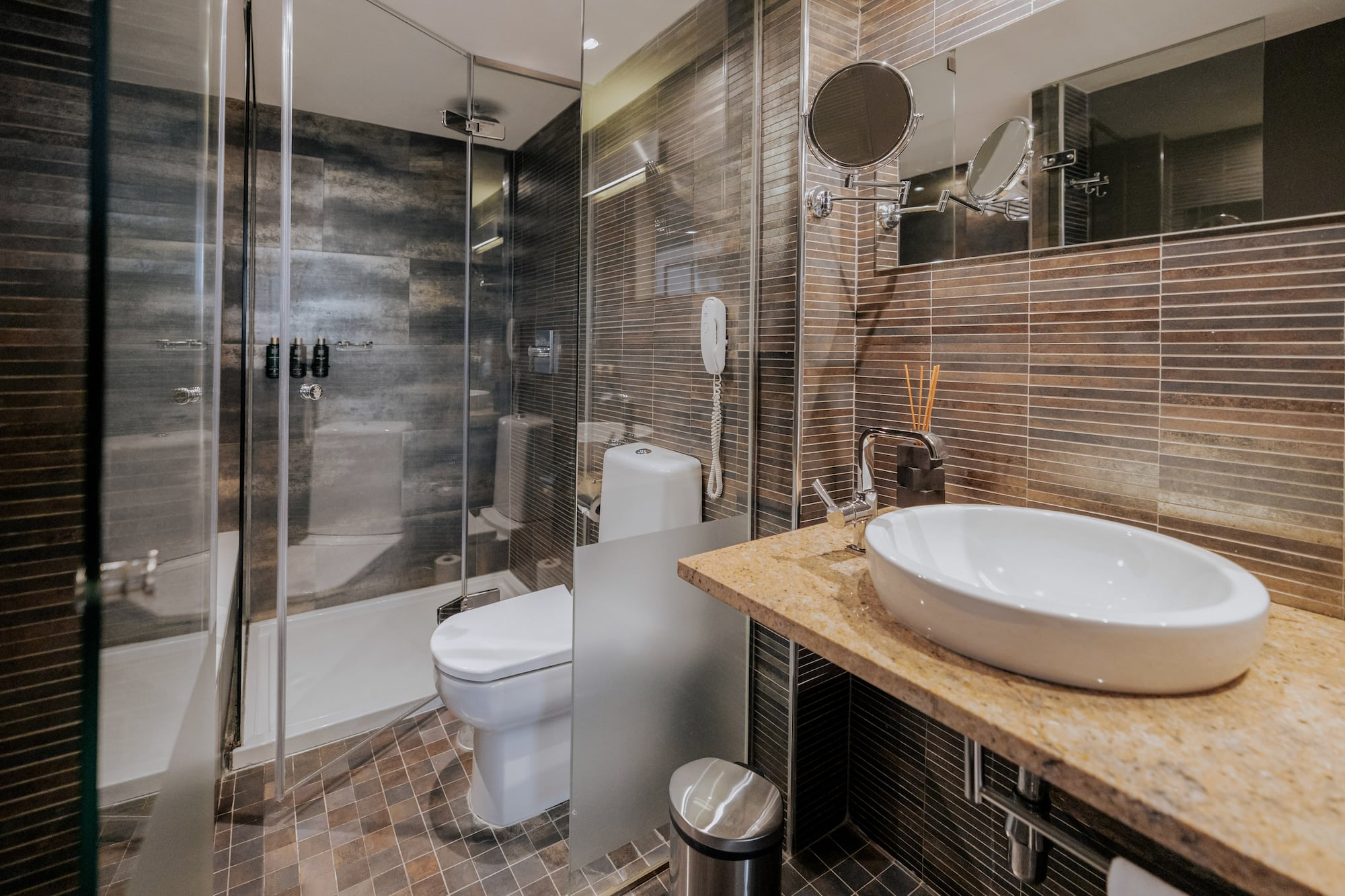 a bathroom with a sink and shower