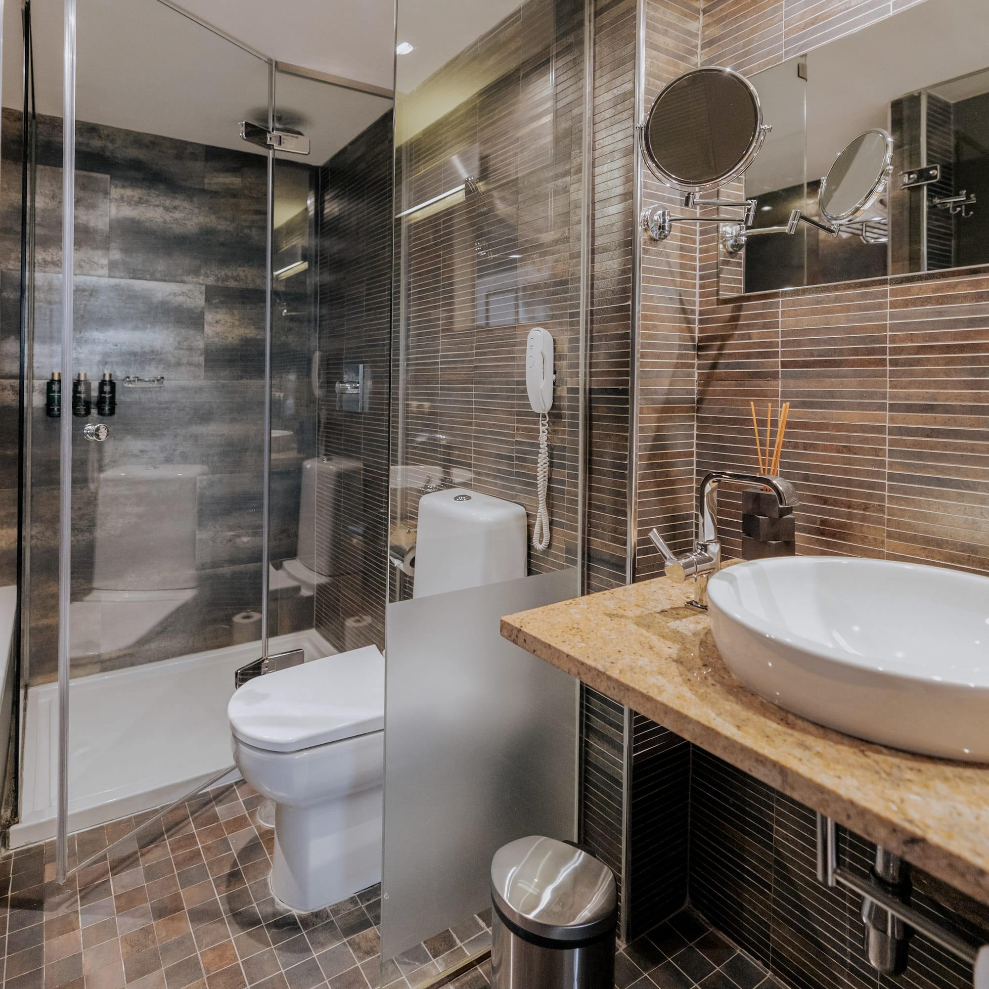 a bathroom with a sink and shower