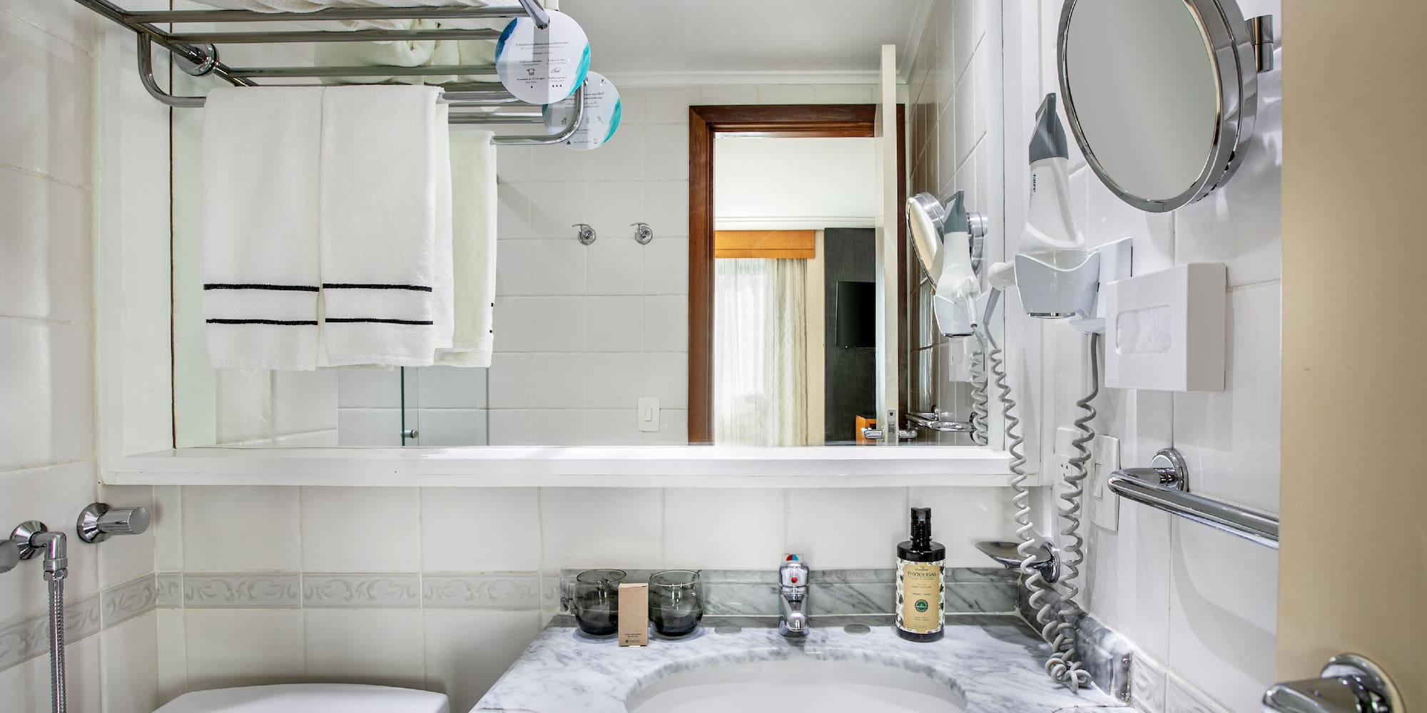 a bathroom with a sink and toilet