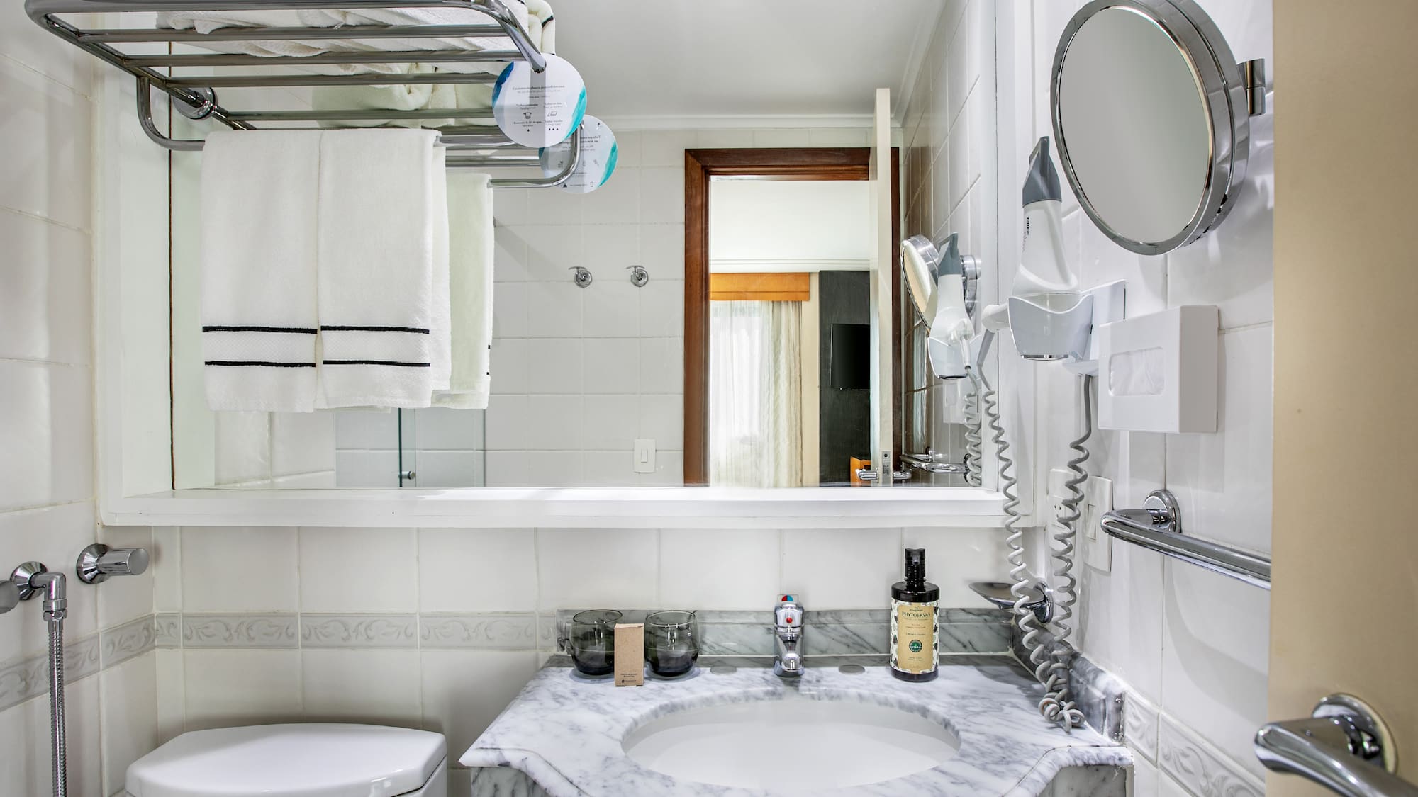 a bathroom with a sink and toilet