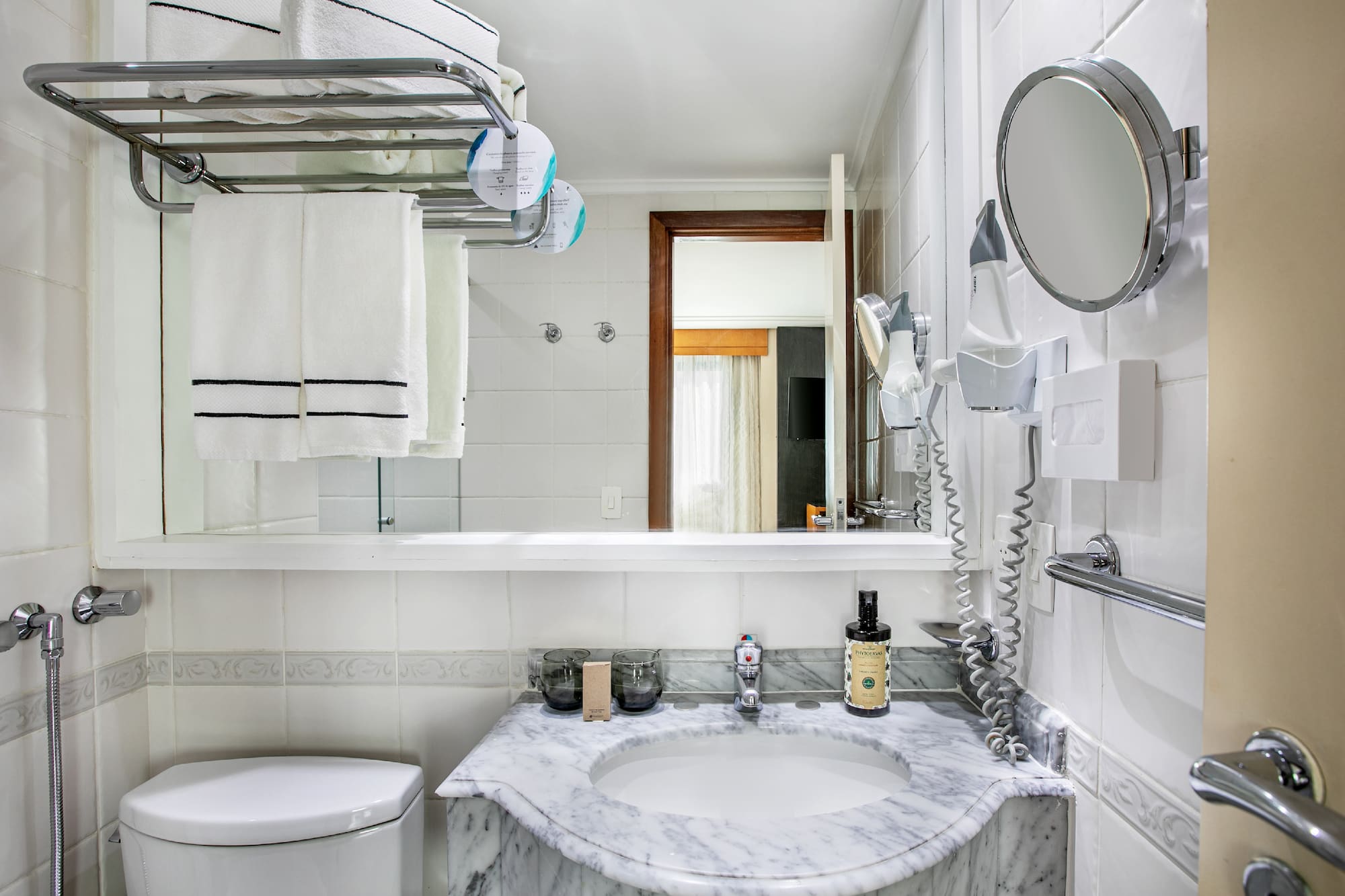 a bathroom with a sink and toilet