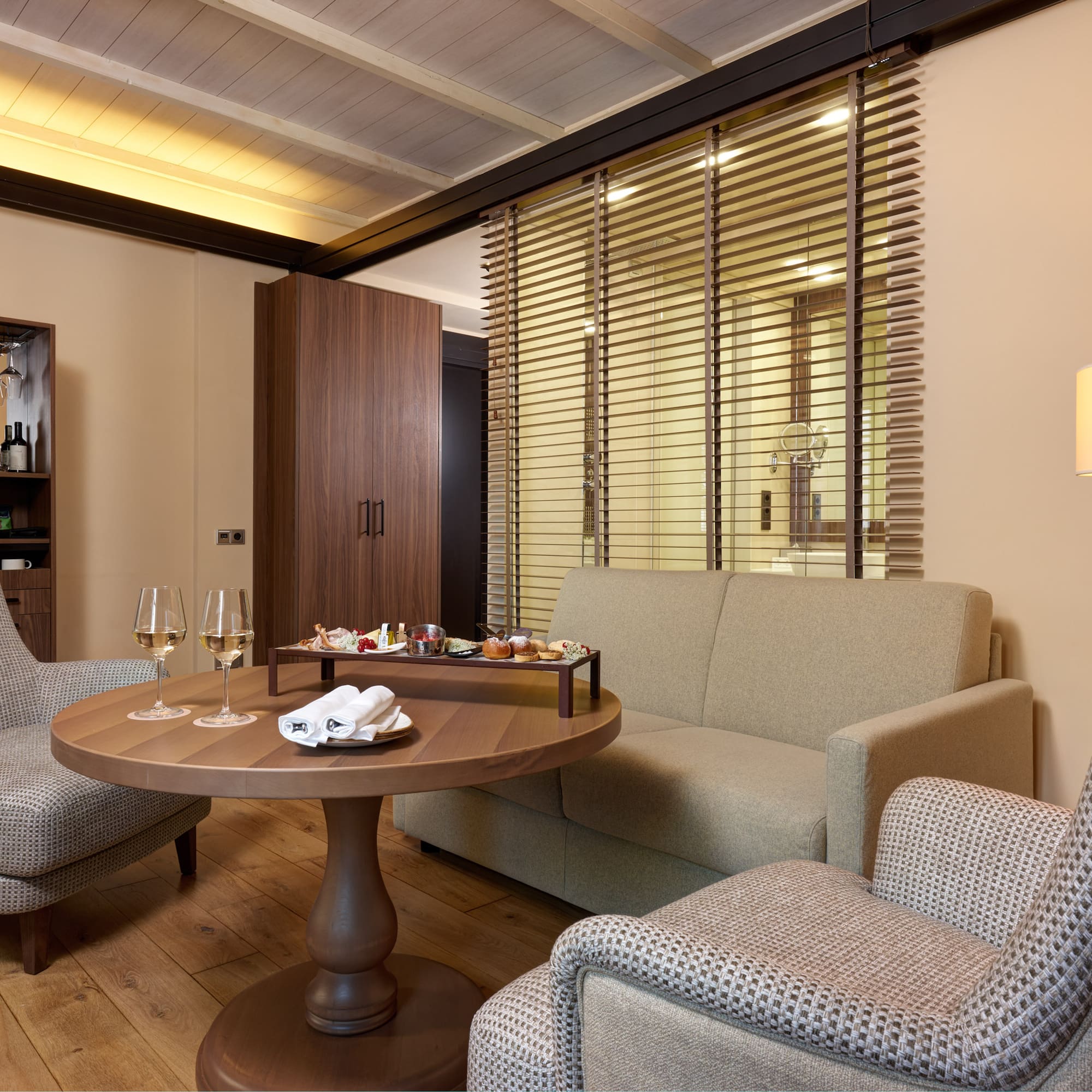 a room with a table and chairs