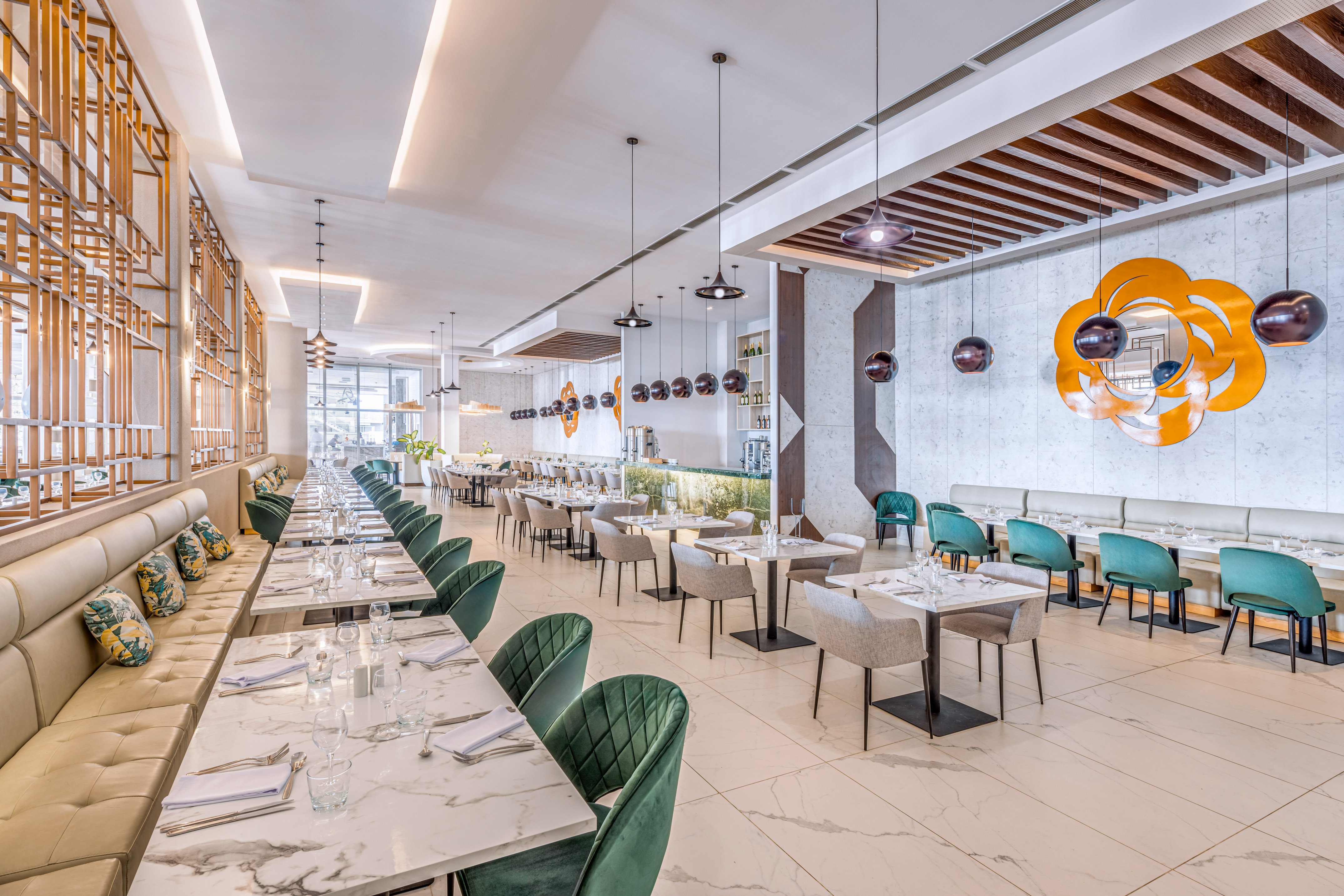 a restaurant with tables and chairs