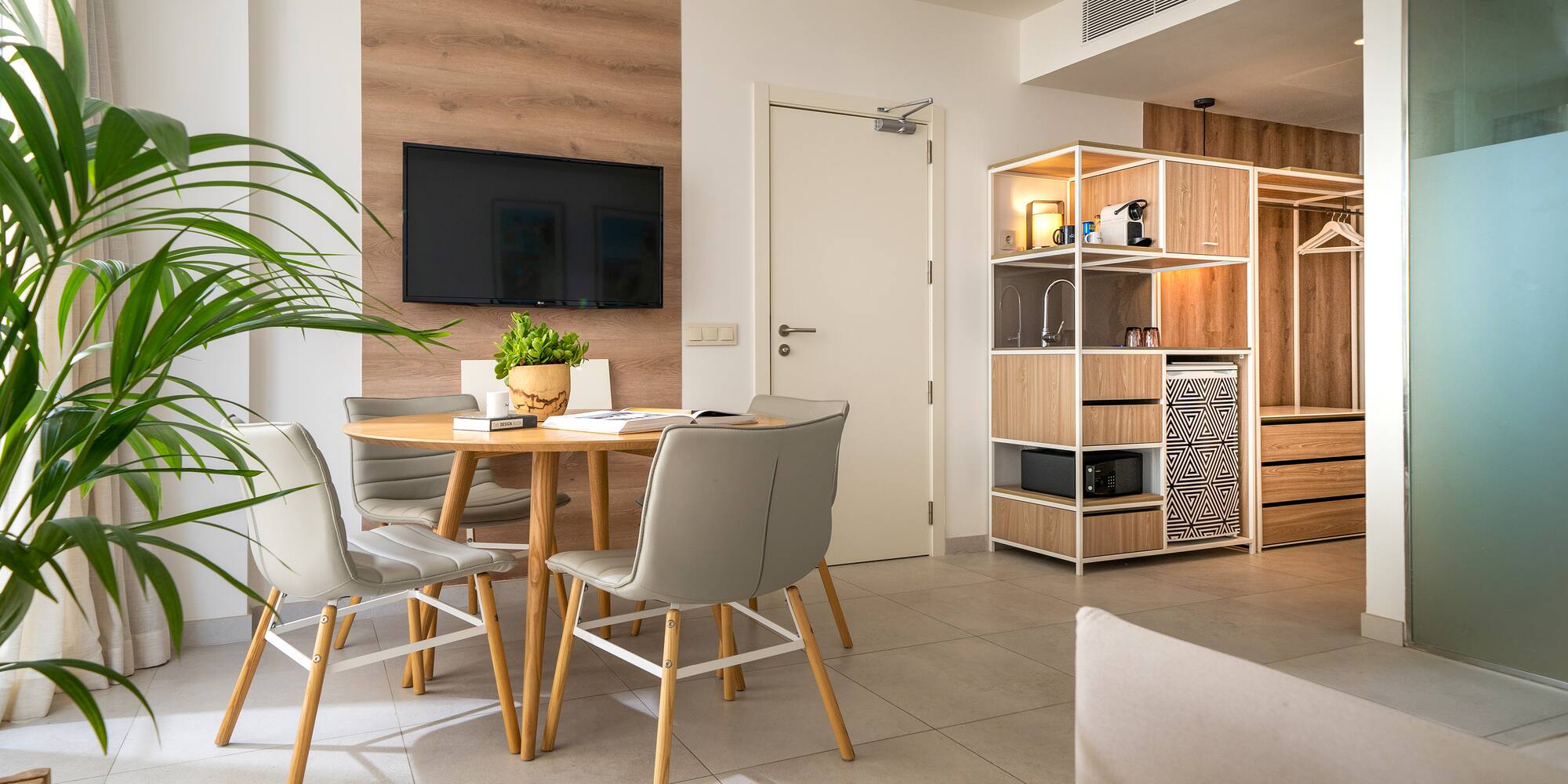 a room with a table and chairs