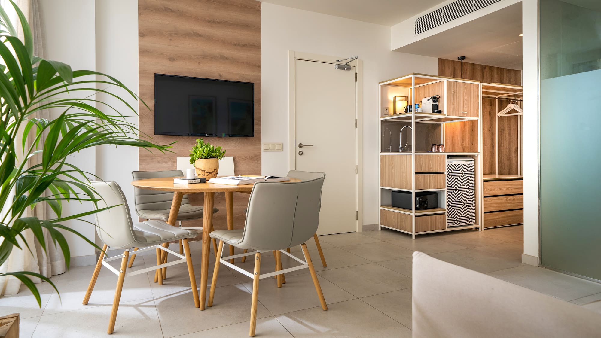 a room with a table and chairs