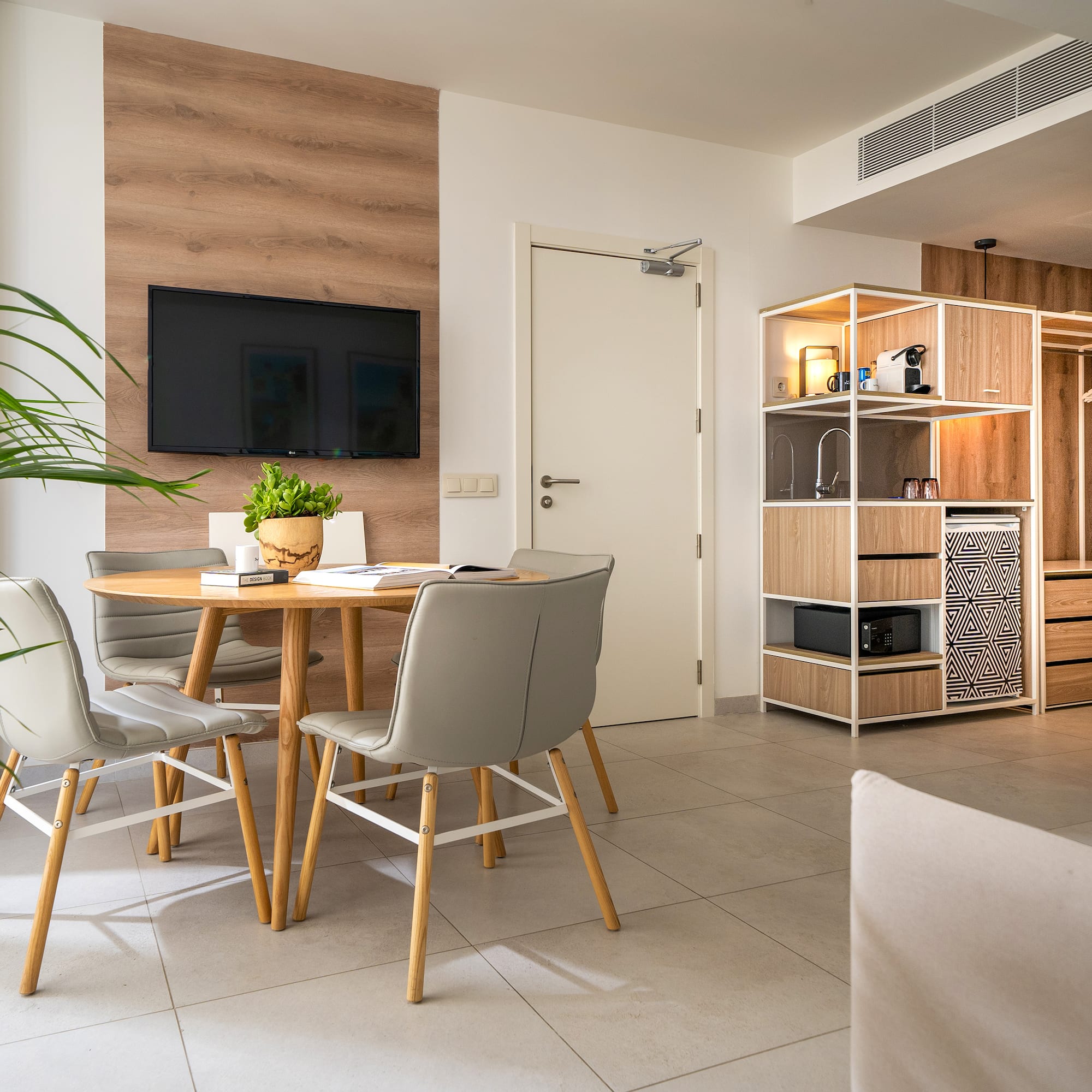 a room with a table and chairs