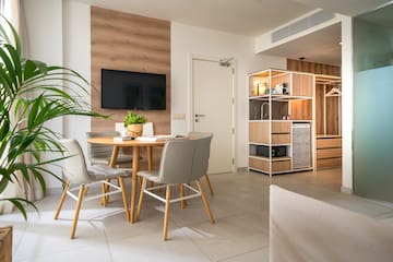 a room with a table and chairs