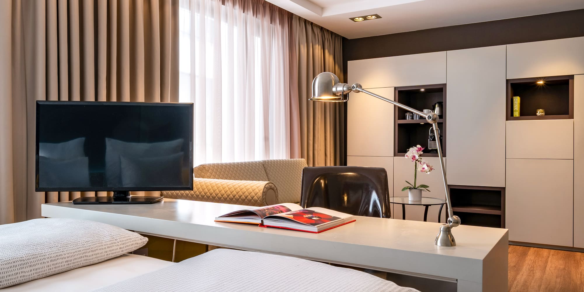 a room with a tv and a table