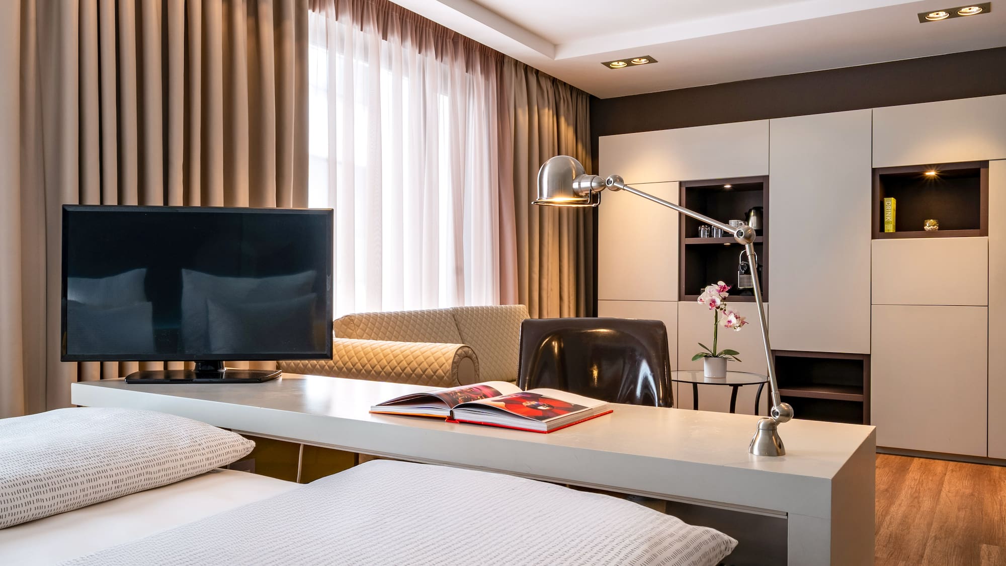 a room with a tv and a table