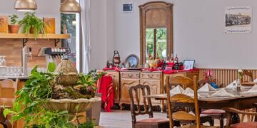 a room with a table and chairs