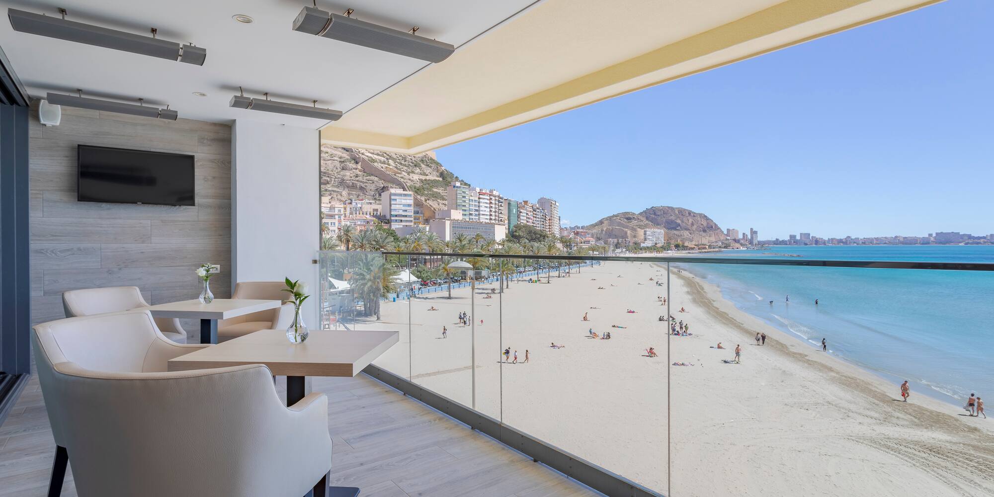 a view of a beach from a balcony