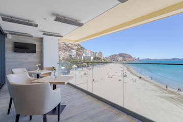 a view of a beach from a balcony