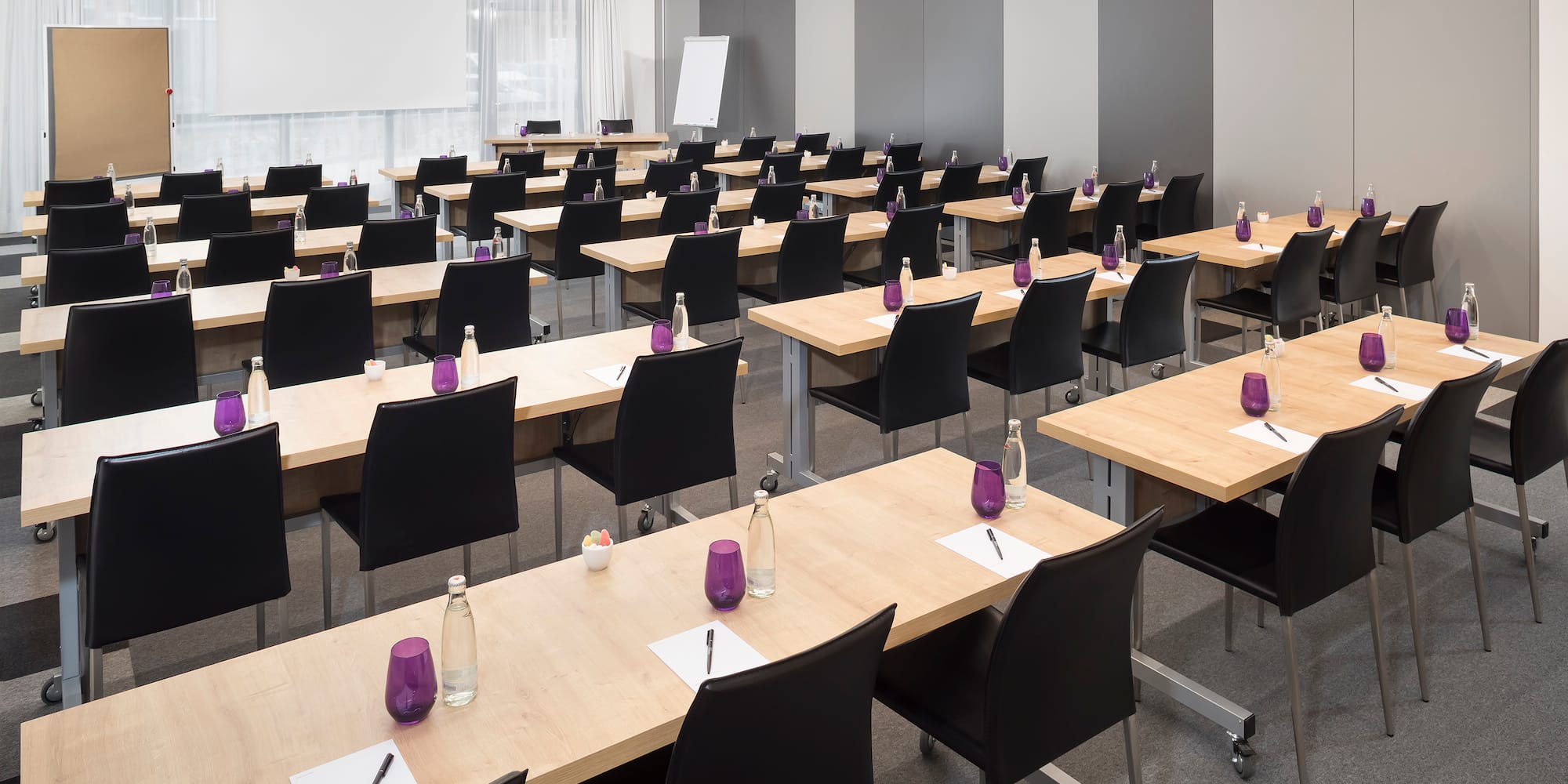 a room with tables and chairs