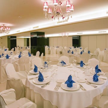 a room with tables and chairs