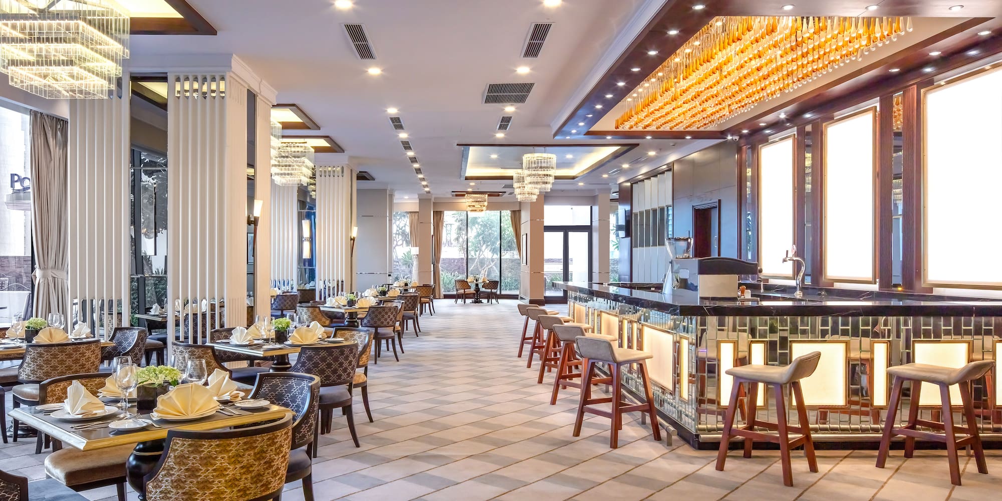 a restaurant with tables and chairs