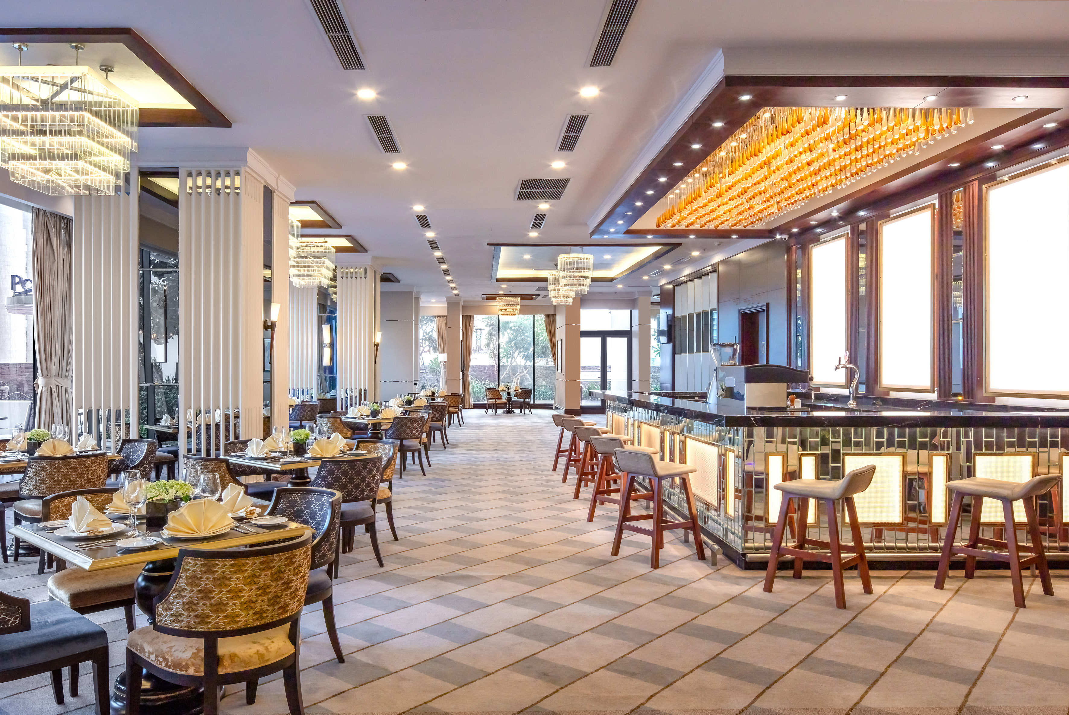 a restaurant with tables and chairs
