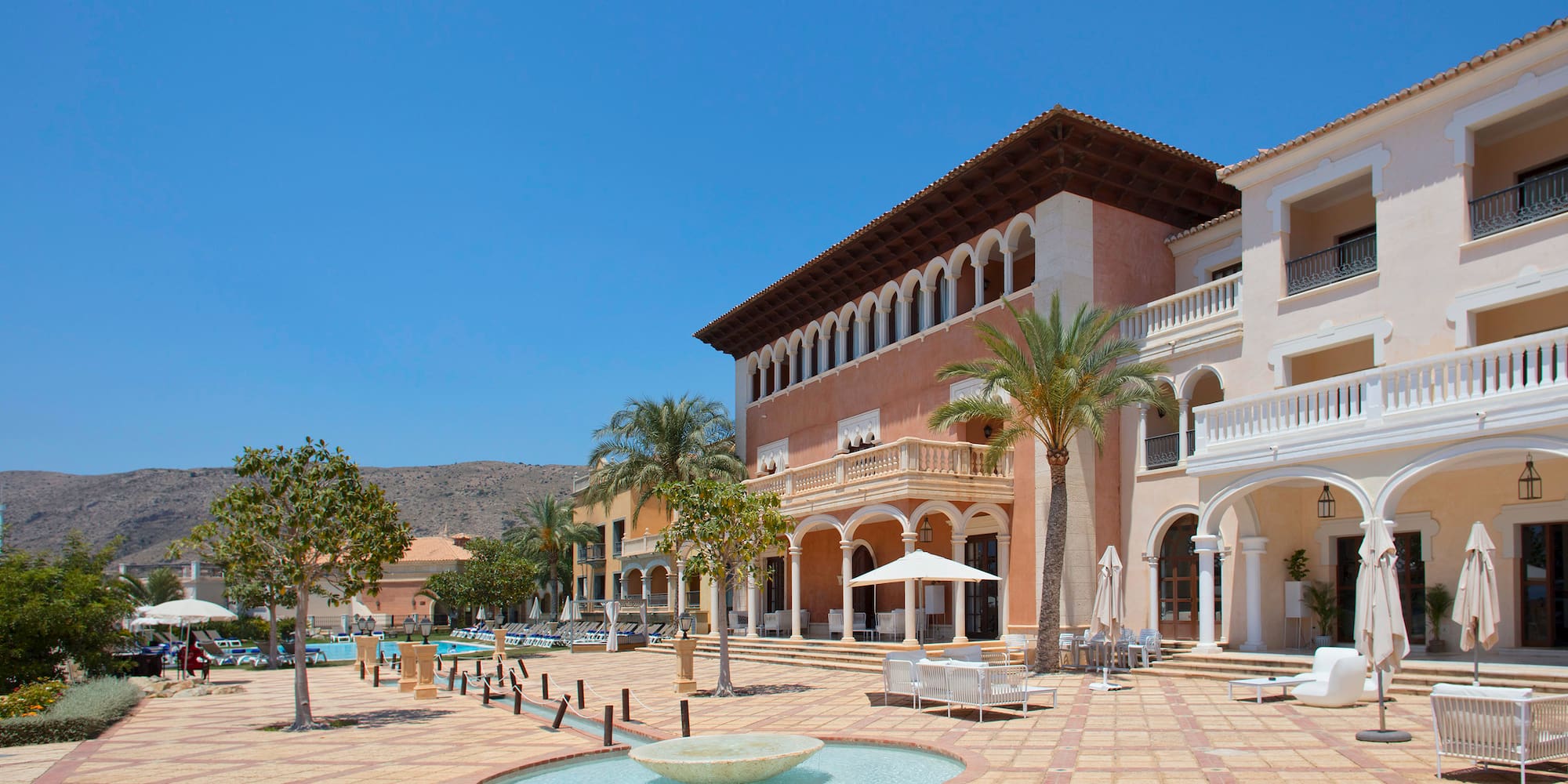 a building with a fountain in front of it