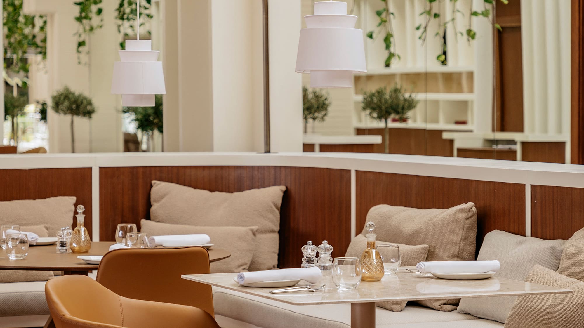 a restaurant with tables and chairs