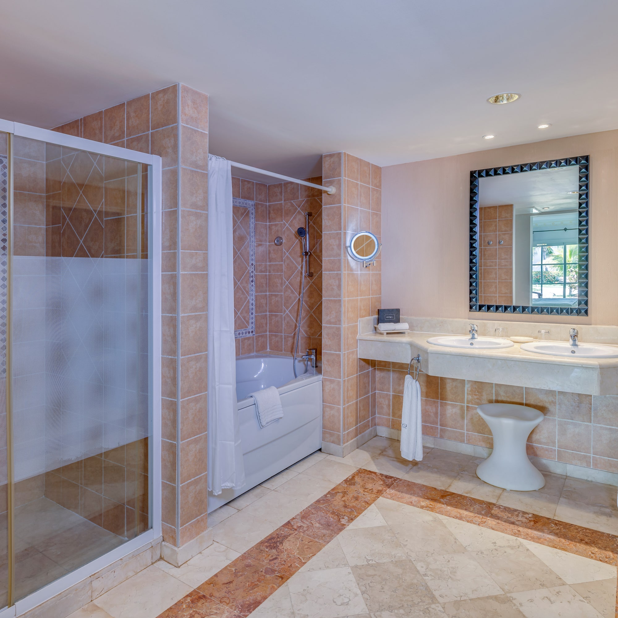 a bathroom with a shower and sink
