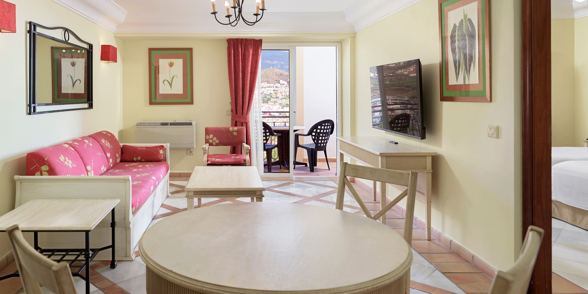 a room with a table and chairs