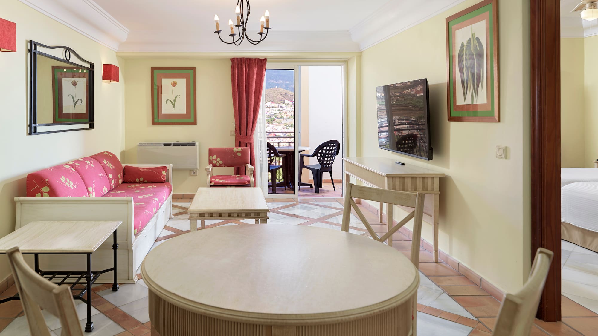 a room with a table and chairs