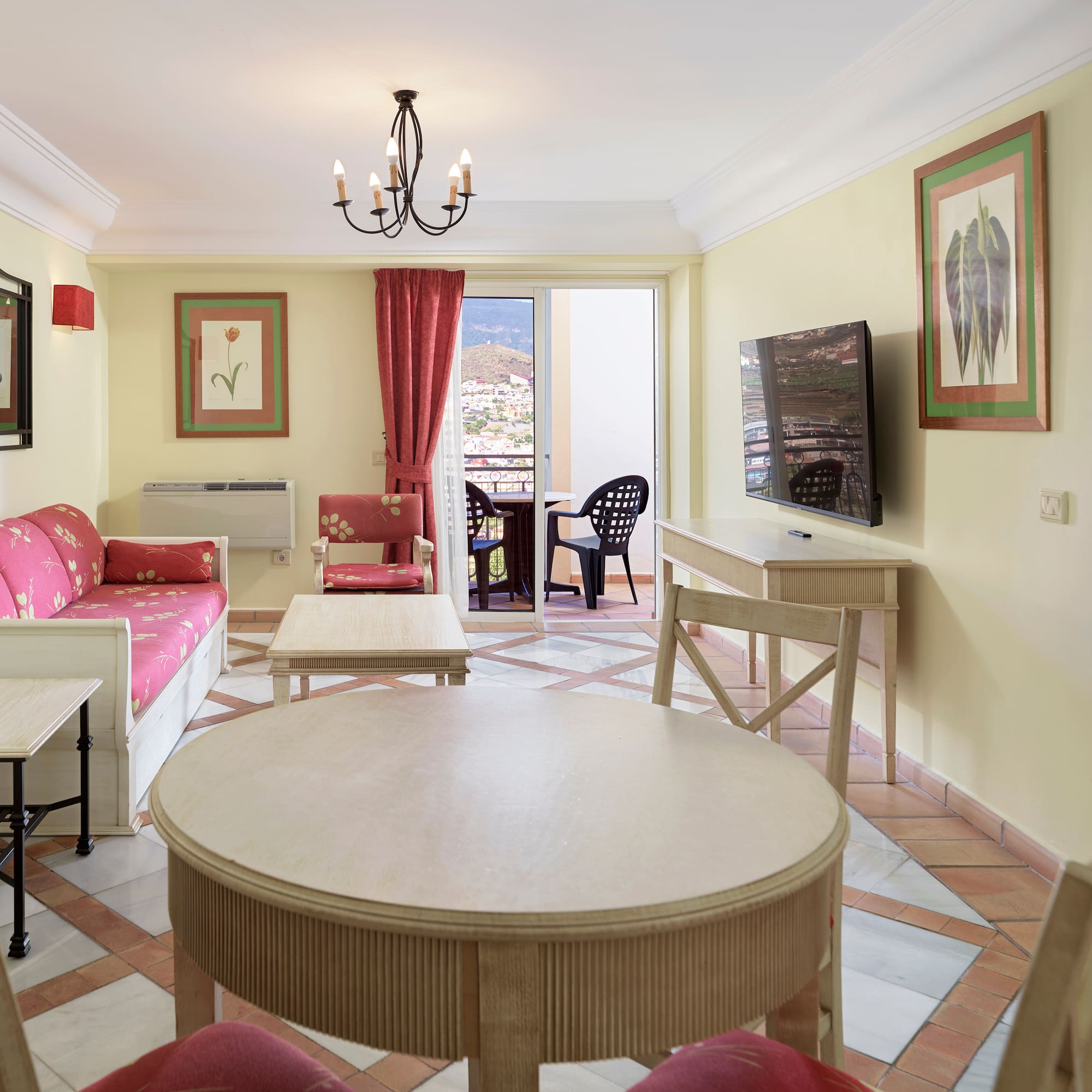 a room with a table and chairs