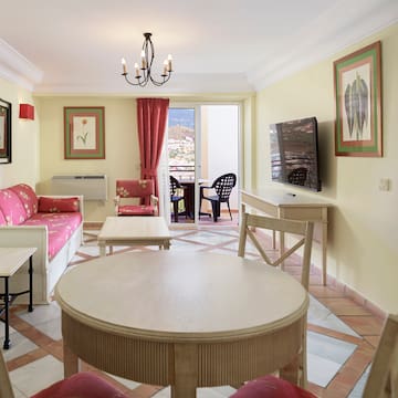 a room with a table and chairs