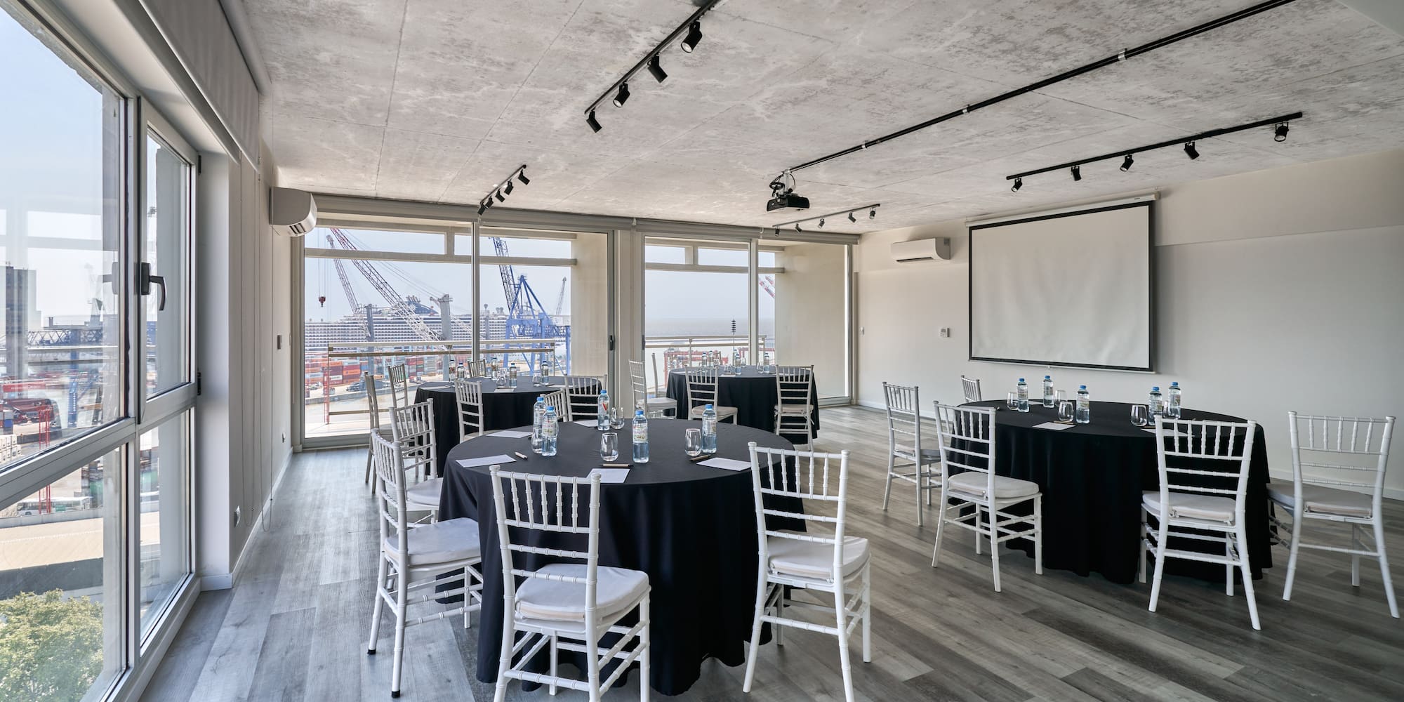 a room with tables and chairs