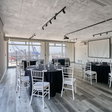a room with tables and chairs