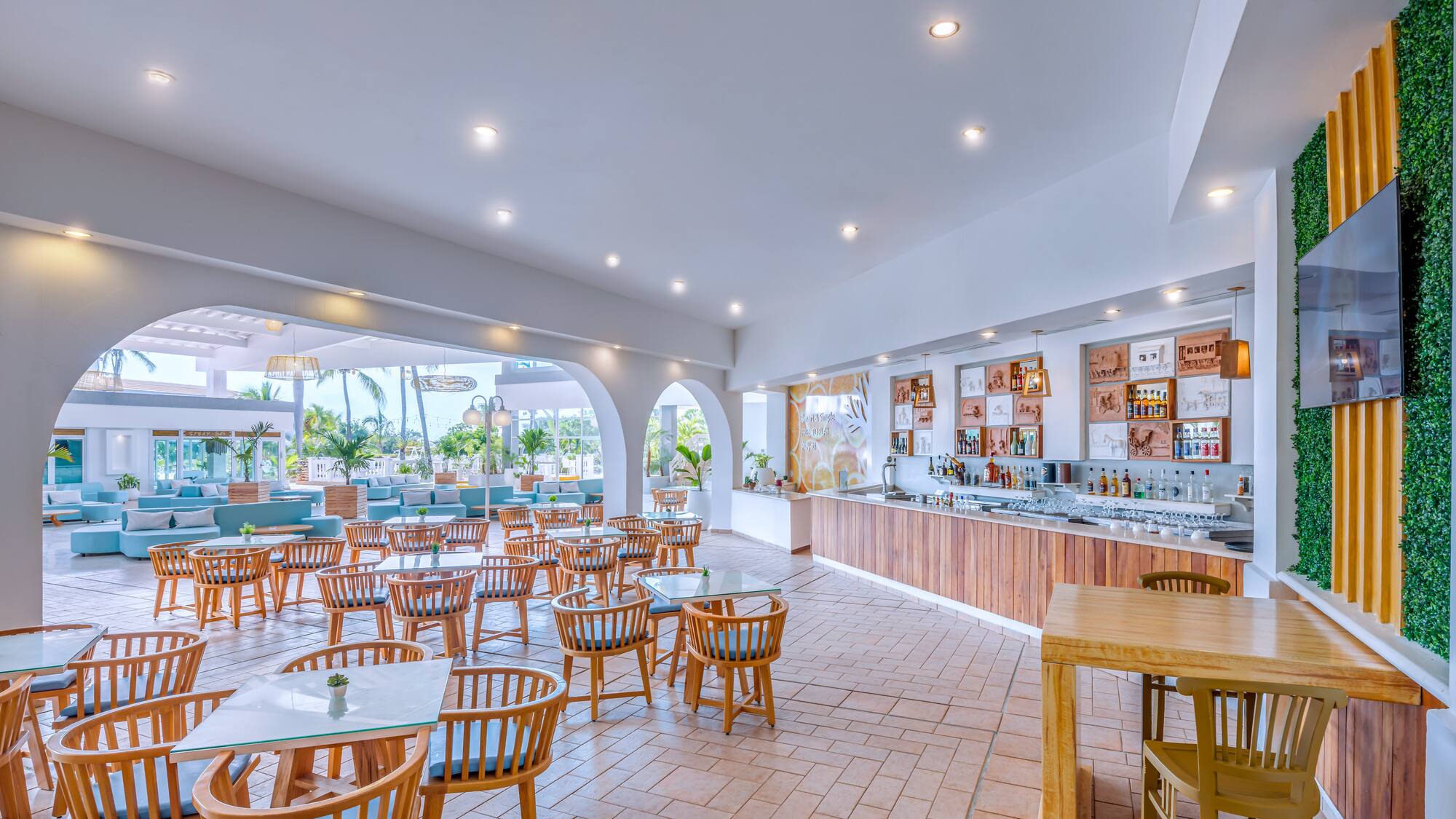 a restaurant with tables and chairs