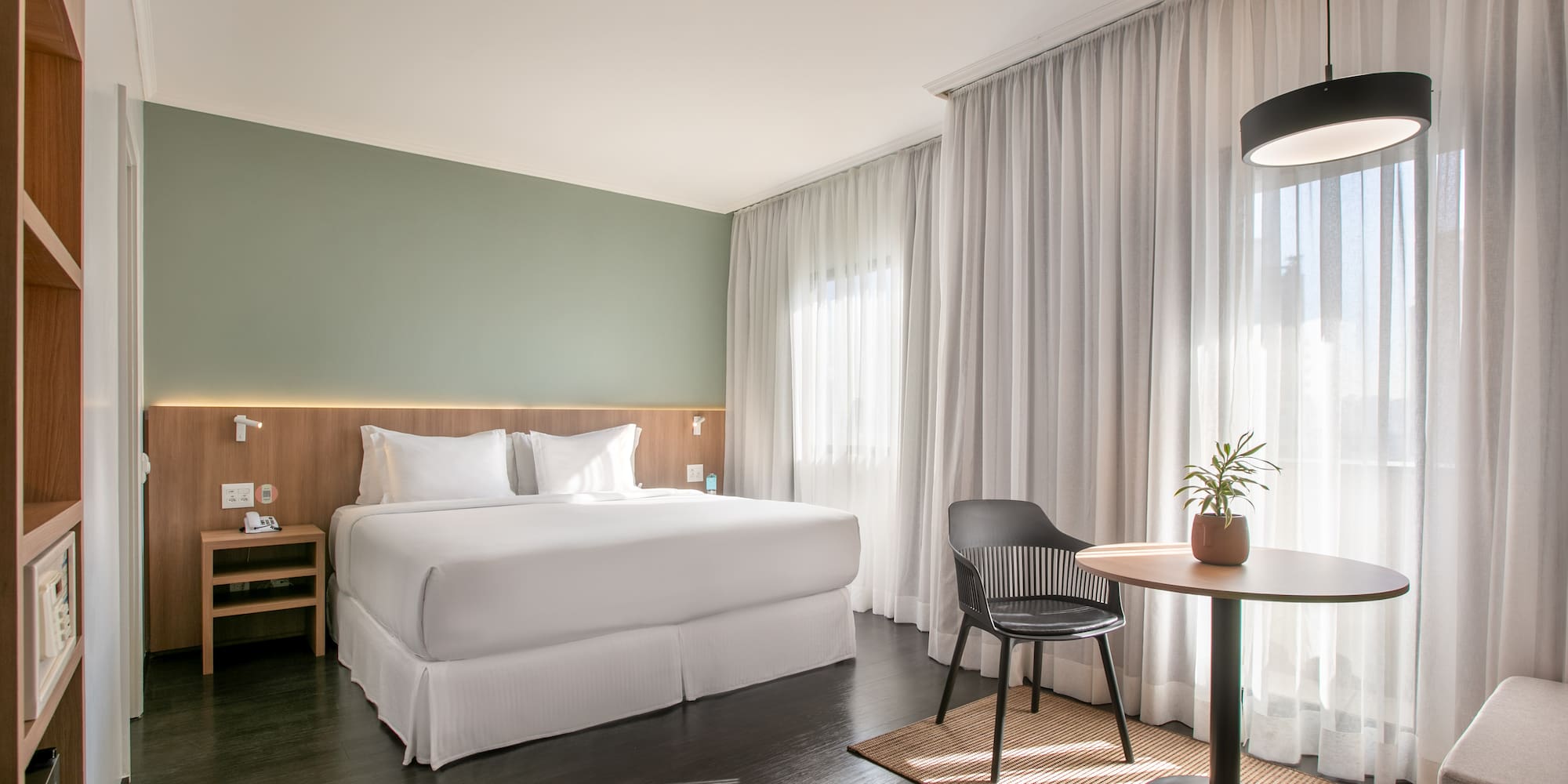 a room with a bed and a table