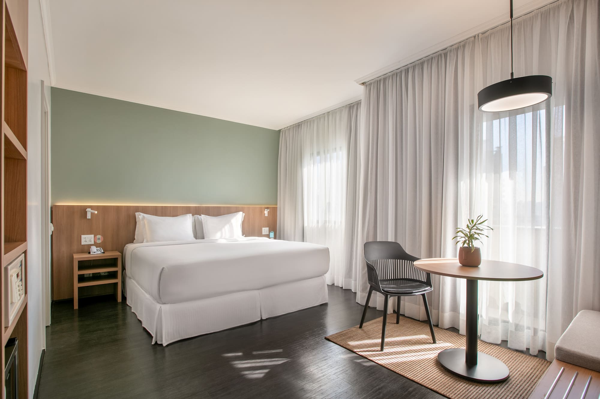 a room with a bed and a table