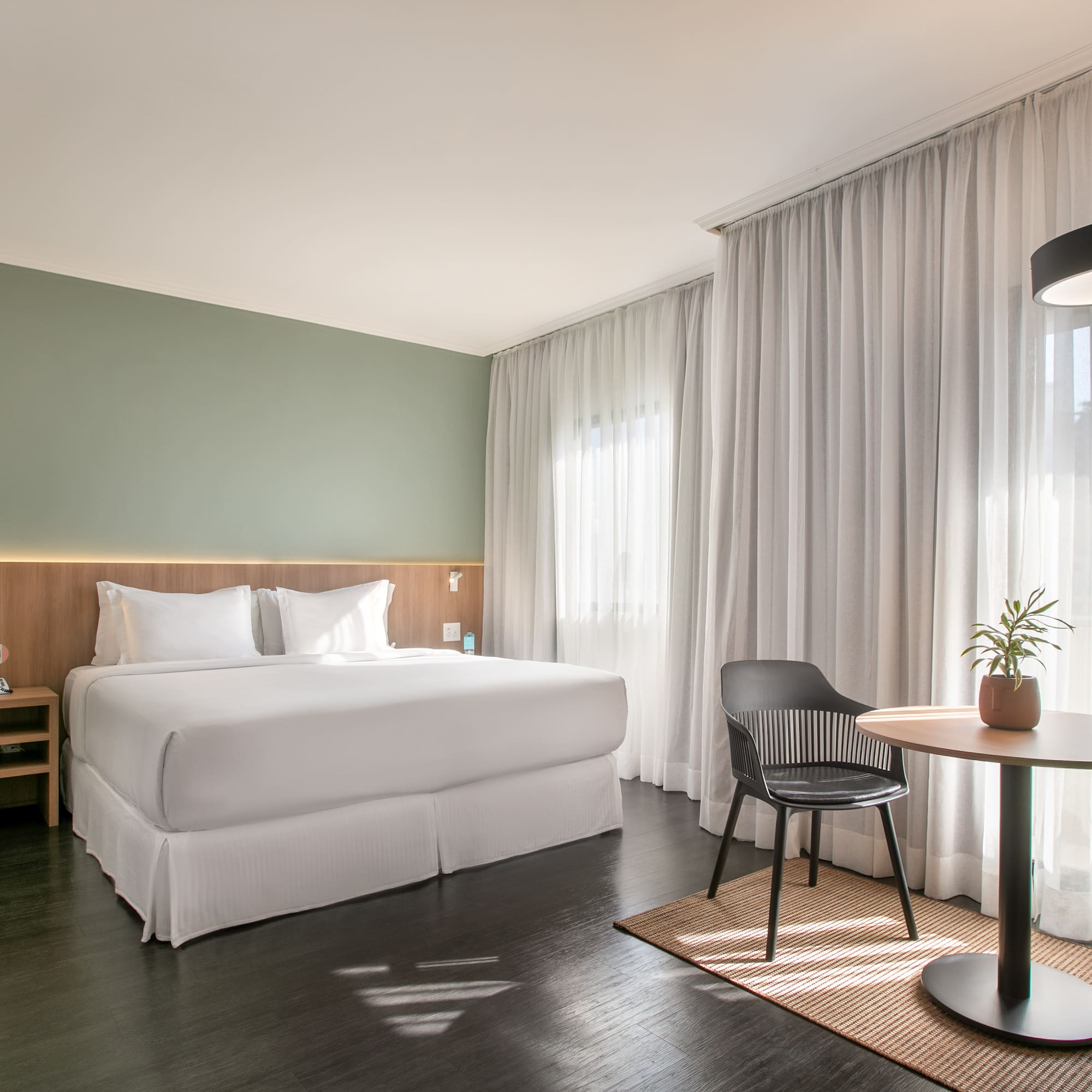 a room with a bed and a table